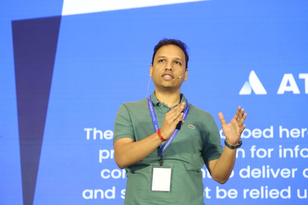 Dushyant Sharma keynoting at the ACE Pune annual community conference — mid-explanation.