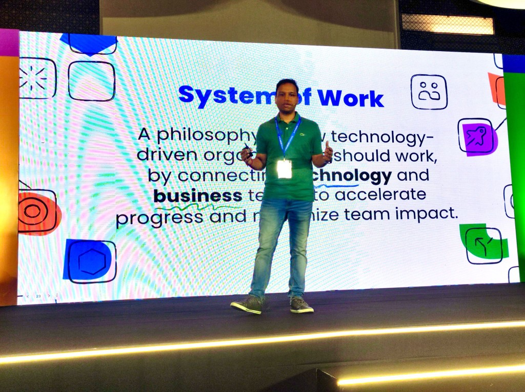 Dushyant Sharma presenting Atlassian’s definition of the System of Work at ACE Pune.